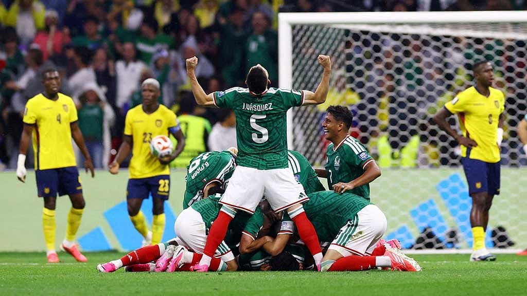 Mexico beat Ecuador 2-0 to reach World Cup last 16 and end knockout hoodoo