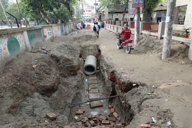 Prolonged dug-up Manikganj road woes for local residents