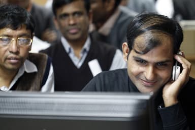 Stocks gain at open as budget measures boost confidence