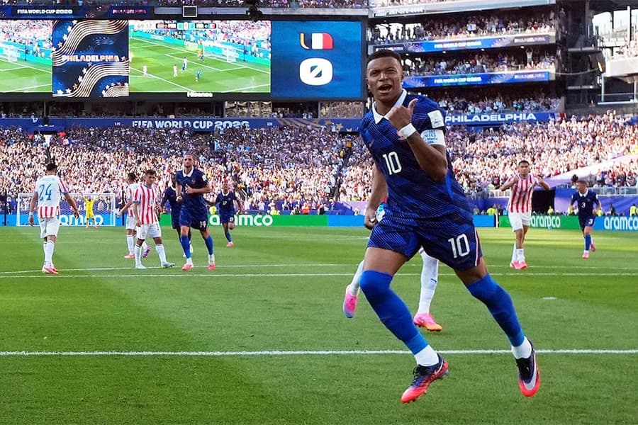 Mbappe keeps cool as France survive furnace against Paraguay